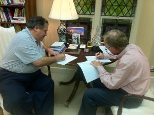 Henry Neufeld and Wesley Wachob contract signing